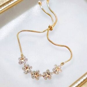 Elegant Gold Floral Bracelet With Stars